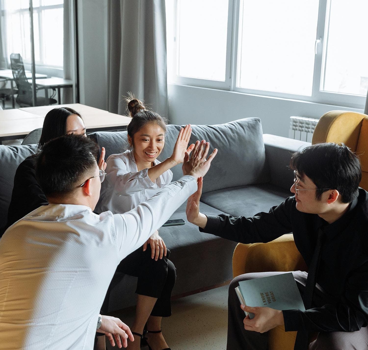 Group of people engaged in a facilitated conversation session